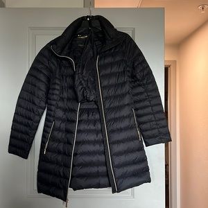 Size medium Michael Kors feather jacket. Great condition. Hoodie is removable